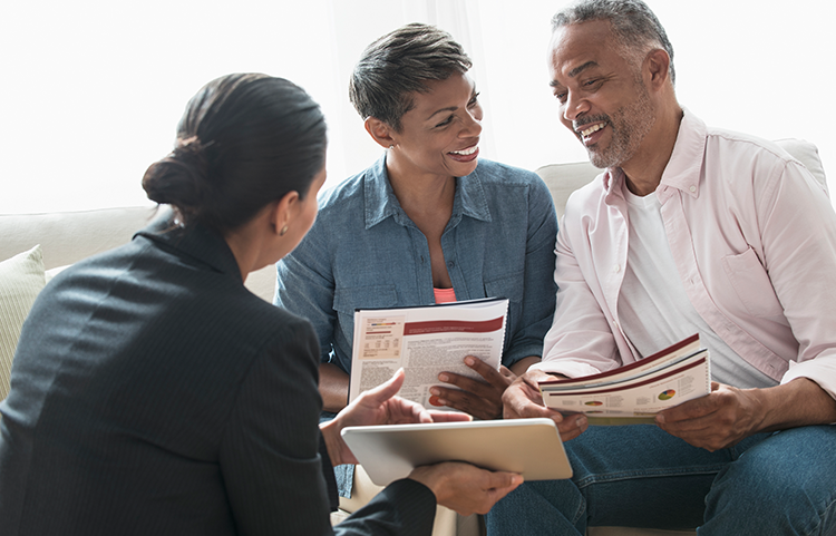 Older couple financial planning their future with their advisor