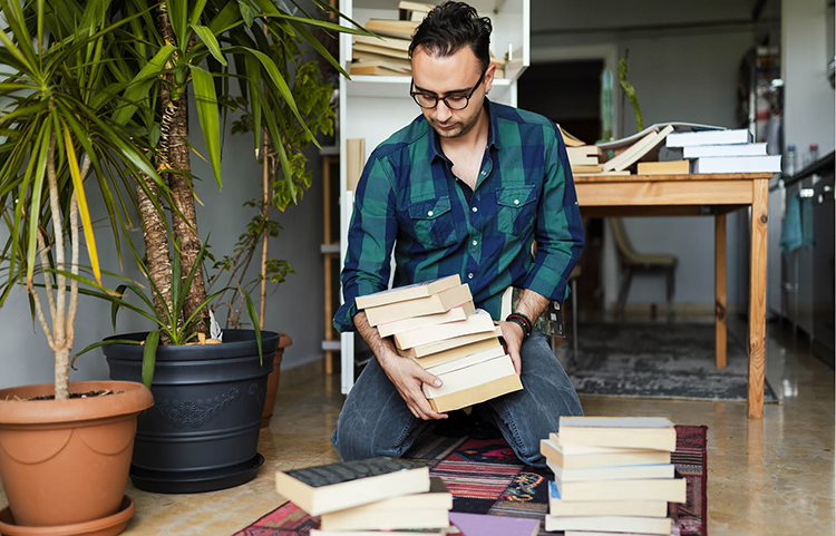 Person organizing books